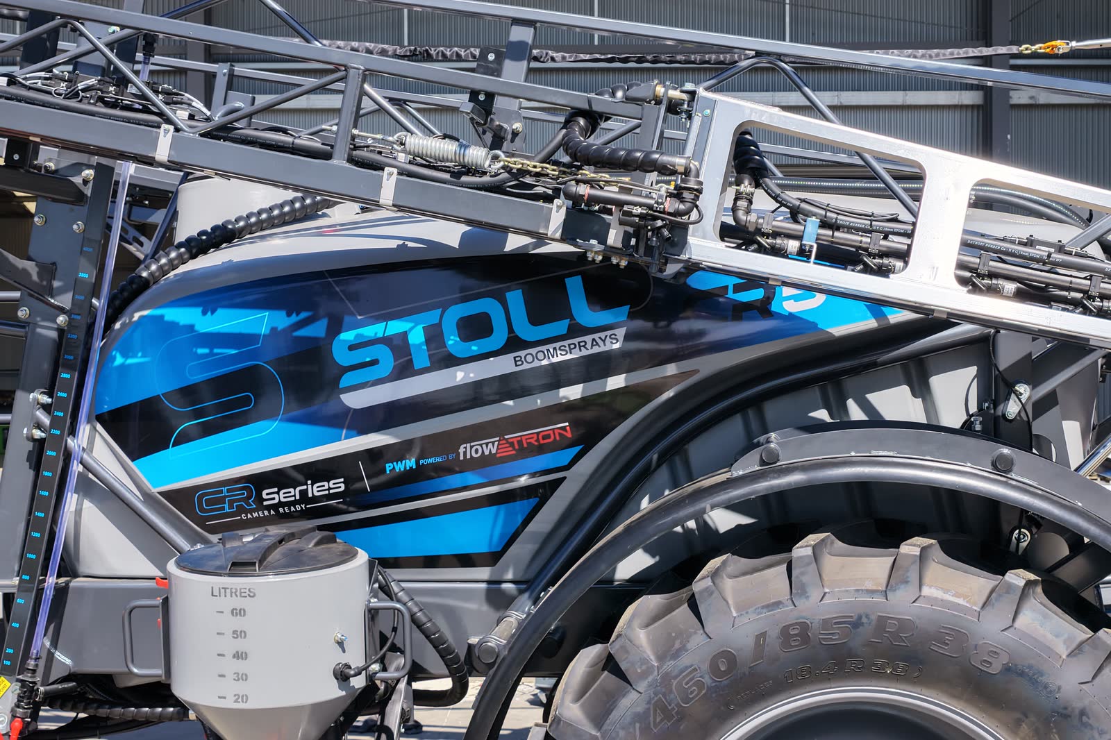 The boom, plumbing and induction hopper of a Stoll CR5