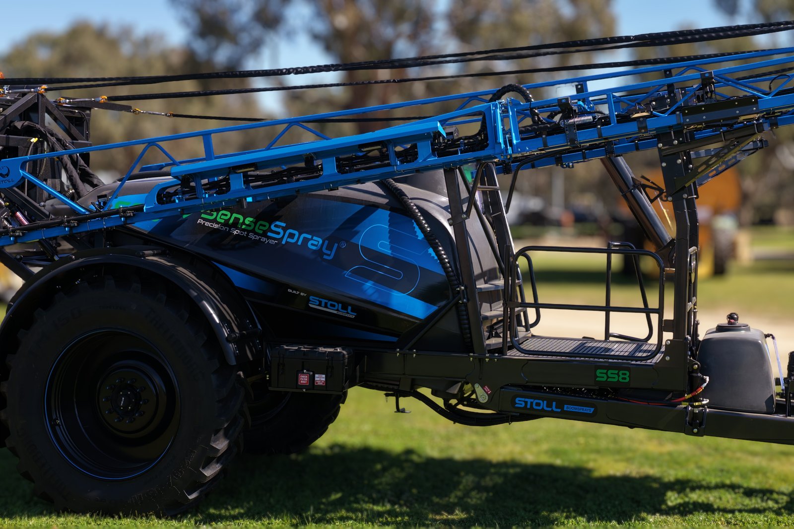 A Stoll SS8 side on with its boom folded, on the stand at the Henty Machinery Field Days