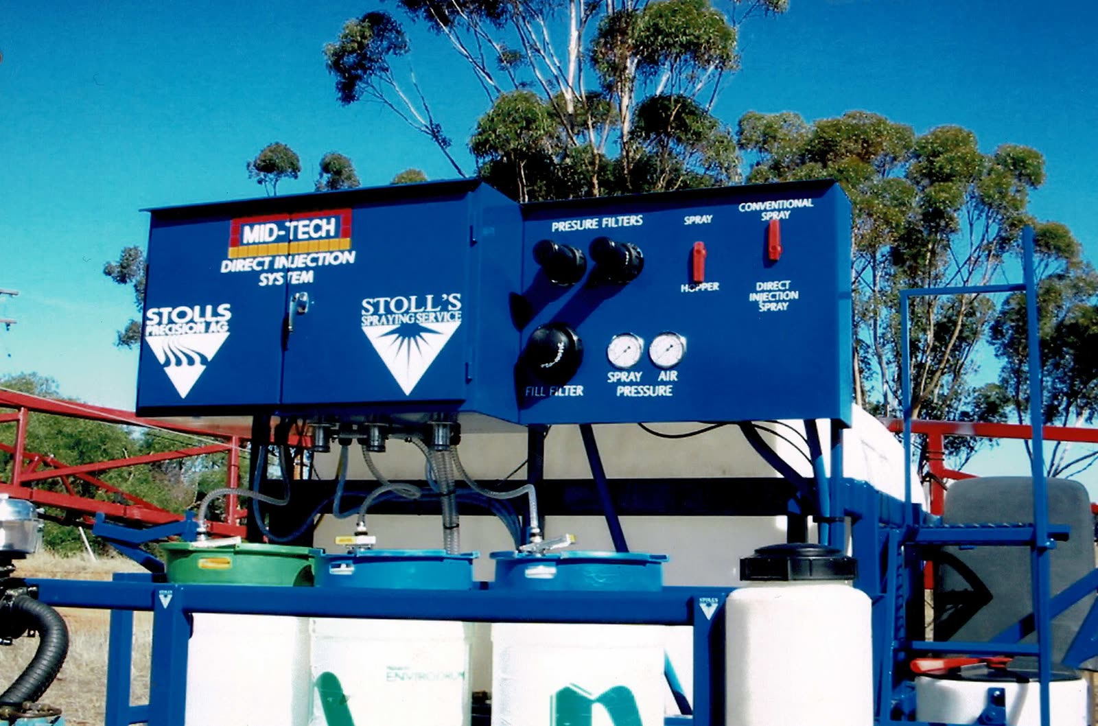 The Mid-Tech direct injection cabinet on an early Stoll's sprayer, labelled for conventional or direct injection spraying